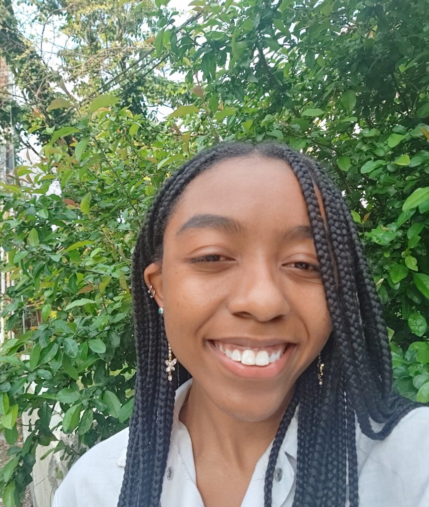 Portrait photo of Christina smiling.